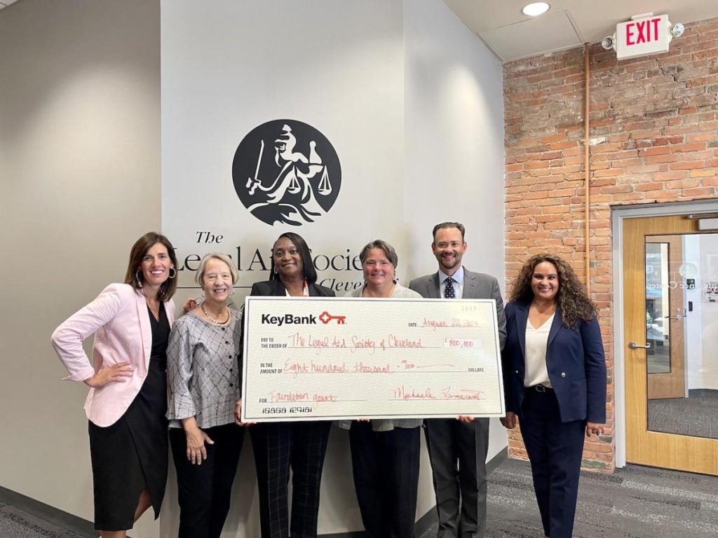 KeyBank Cleveland team members present an $800