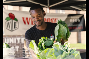 DaQuan Campbell holding cabbages